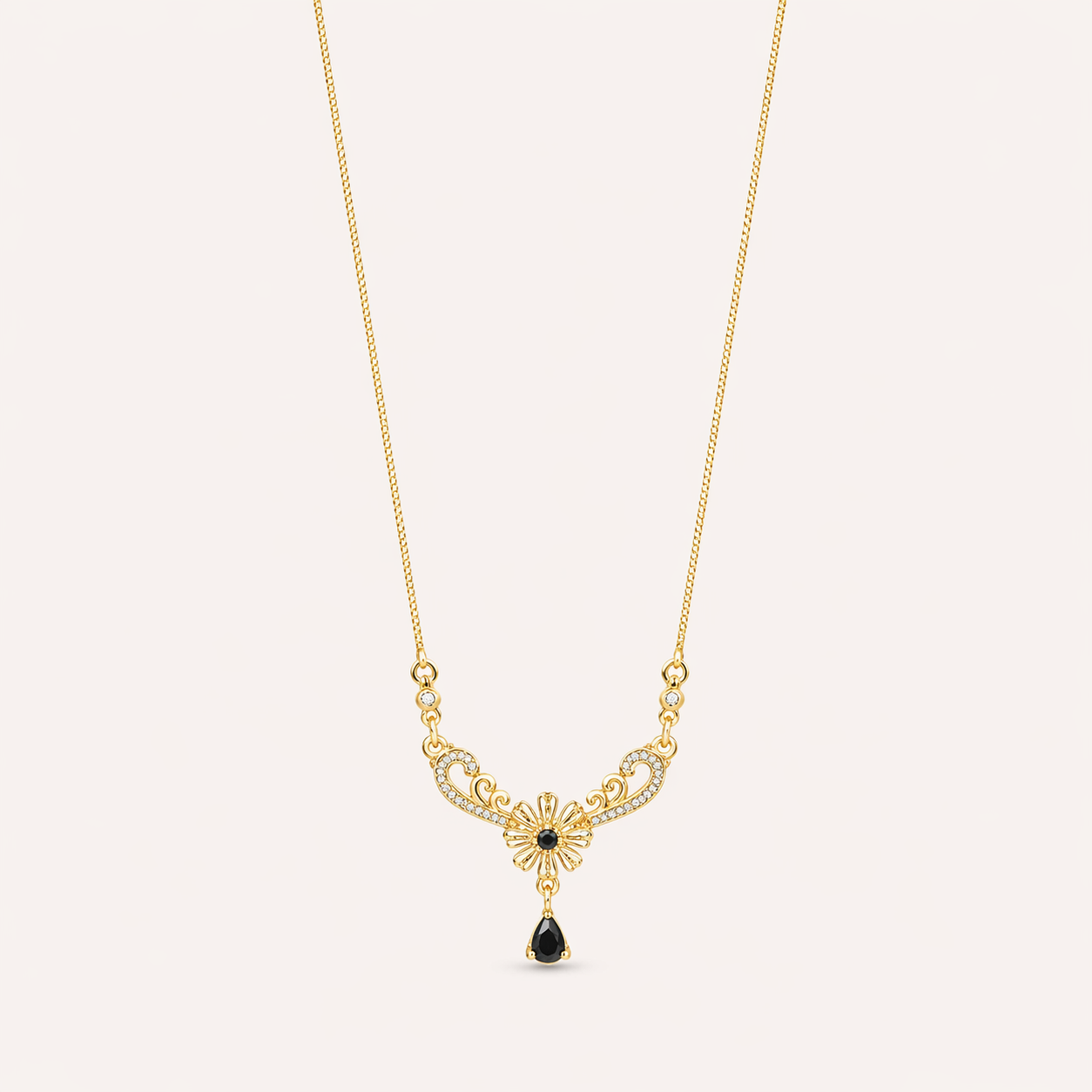 Delicate Gold Floral Filigree Necklace with Black Teardrop